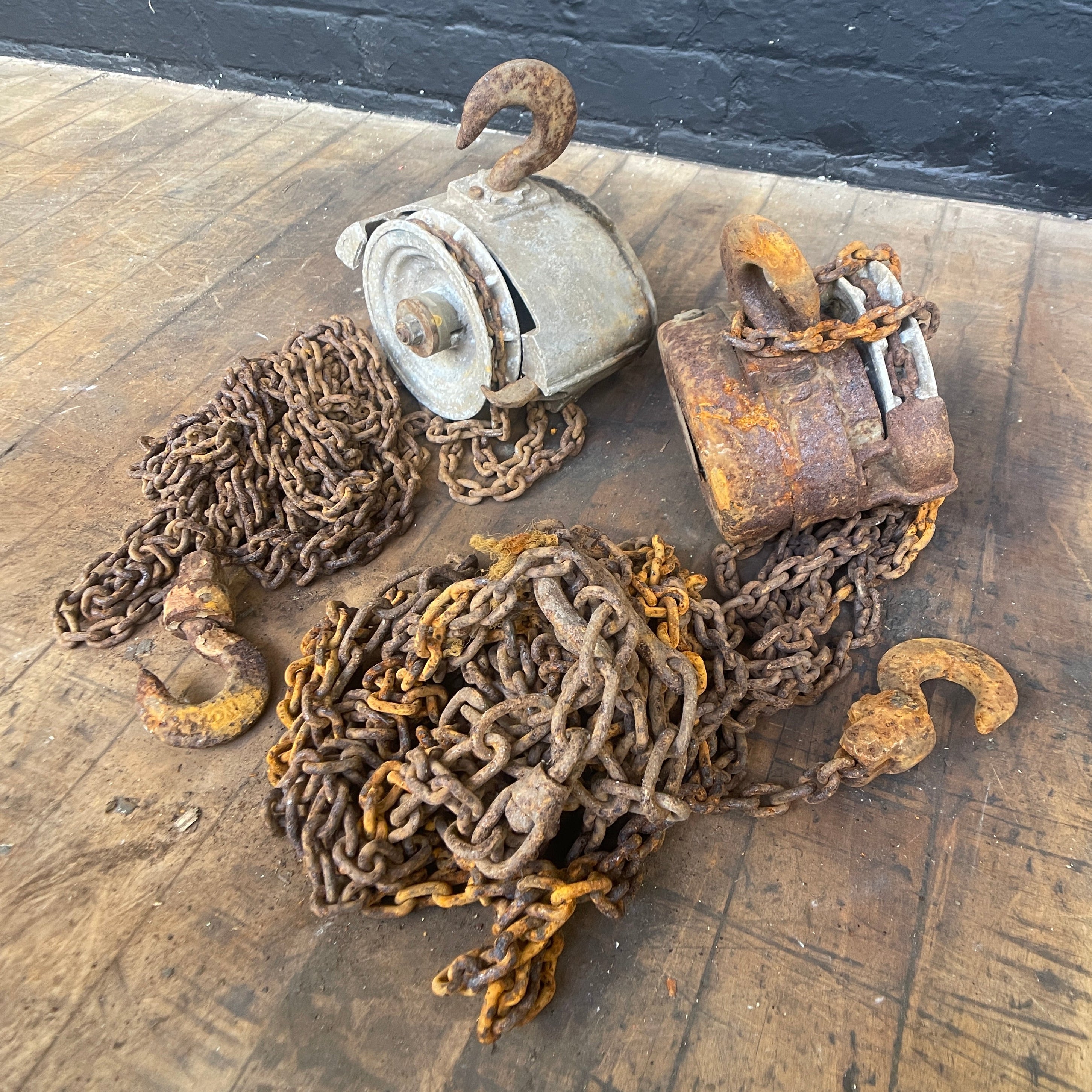 Industrial powerhouse props prop rental hire vintage movie film set dec block tackle hoist chain winch hook