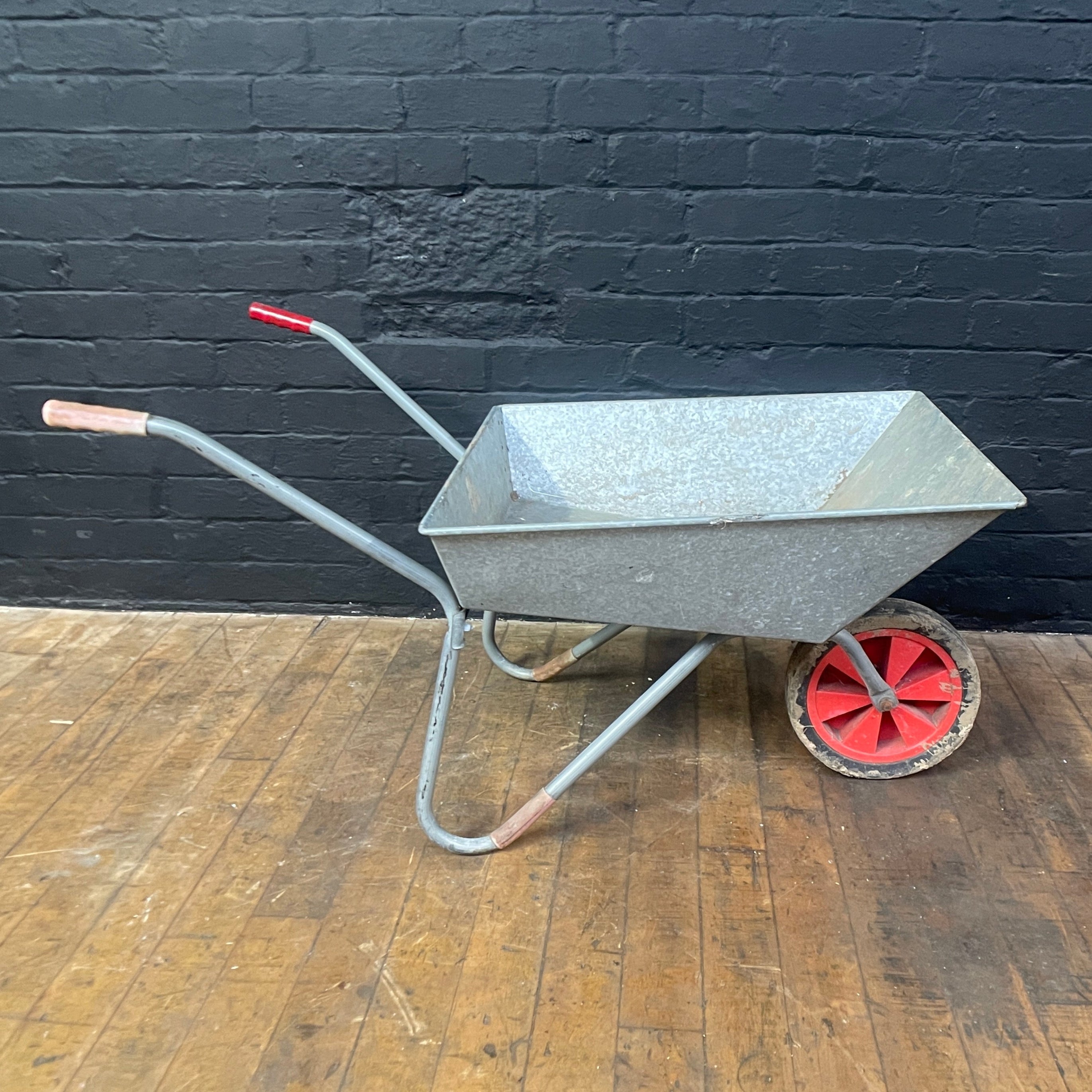 Industrial powerhouse props prop rental hire vintage movie film set dec galvanised wheel barrow old red