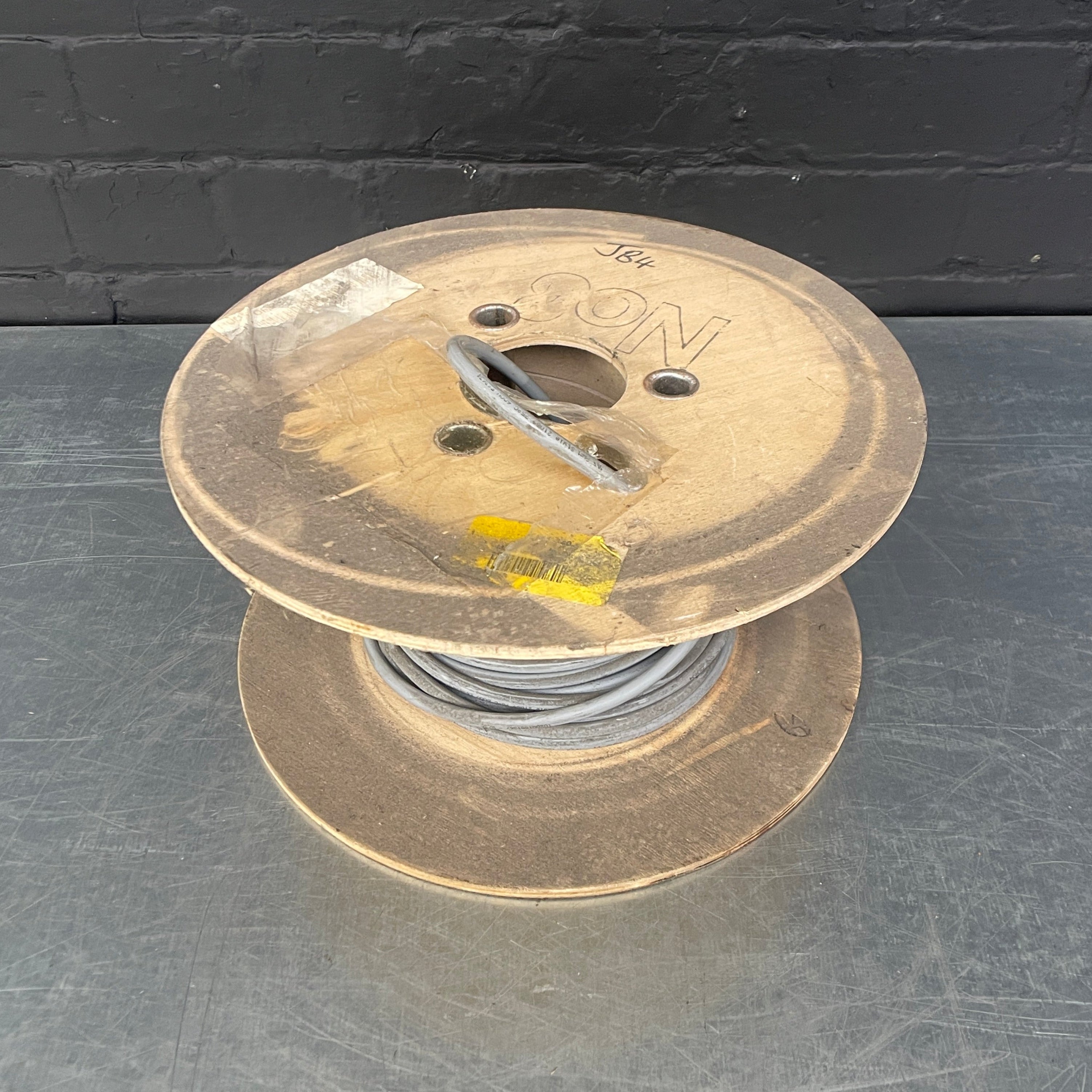 Industrial powerhouse props prop rental hire vintage movie film set dec light lighting cable reel garage tool tools grey workshop electrical 3