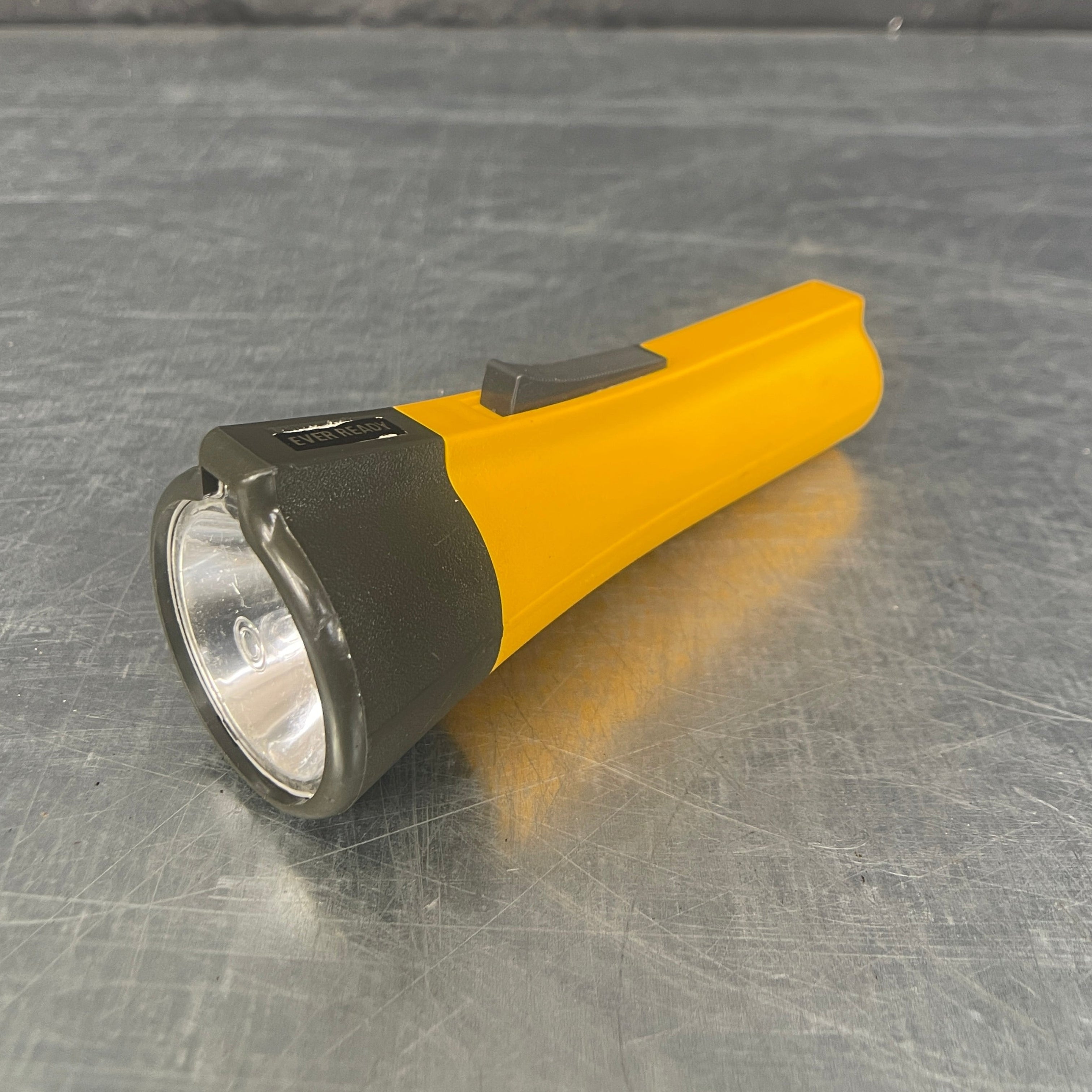 Industrial powerhouse props prop rental hire vintage movie film set dec light lighting ever ready torch yellow