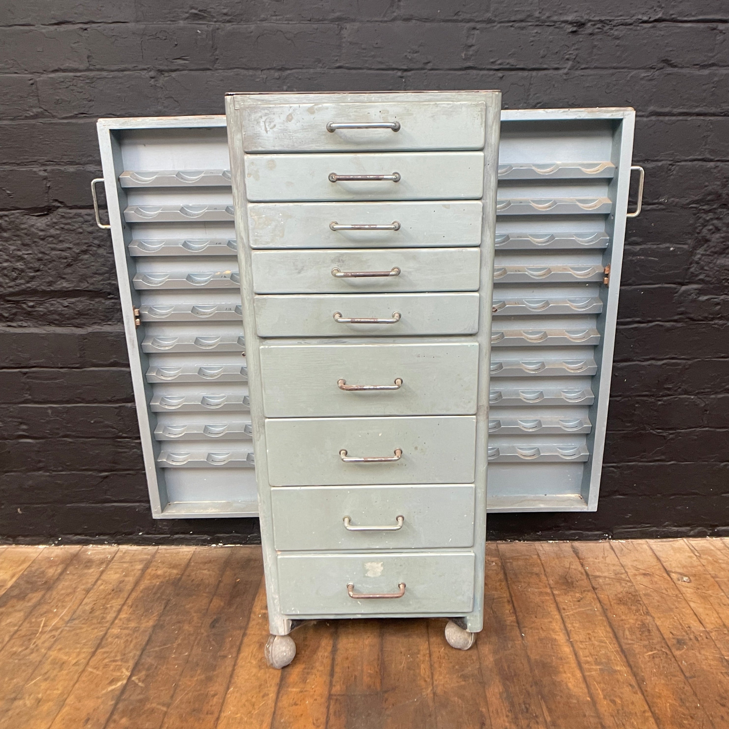 Industrial powerhouse props prop rental hire vintage movie film set dec opticians cabinet drawers green