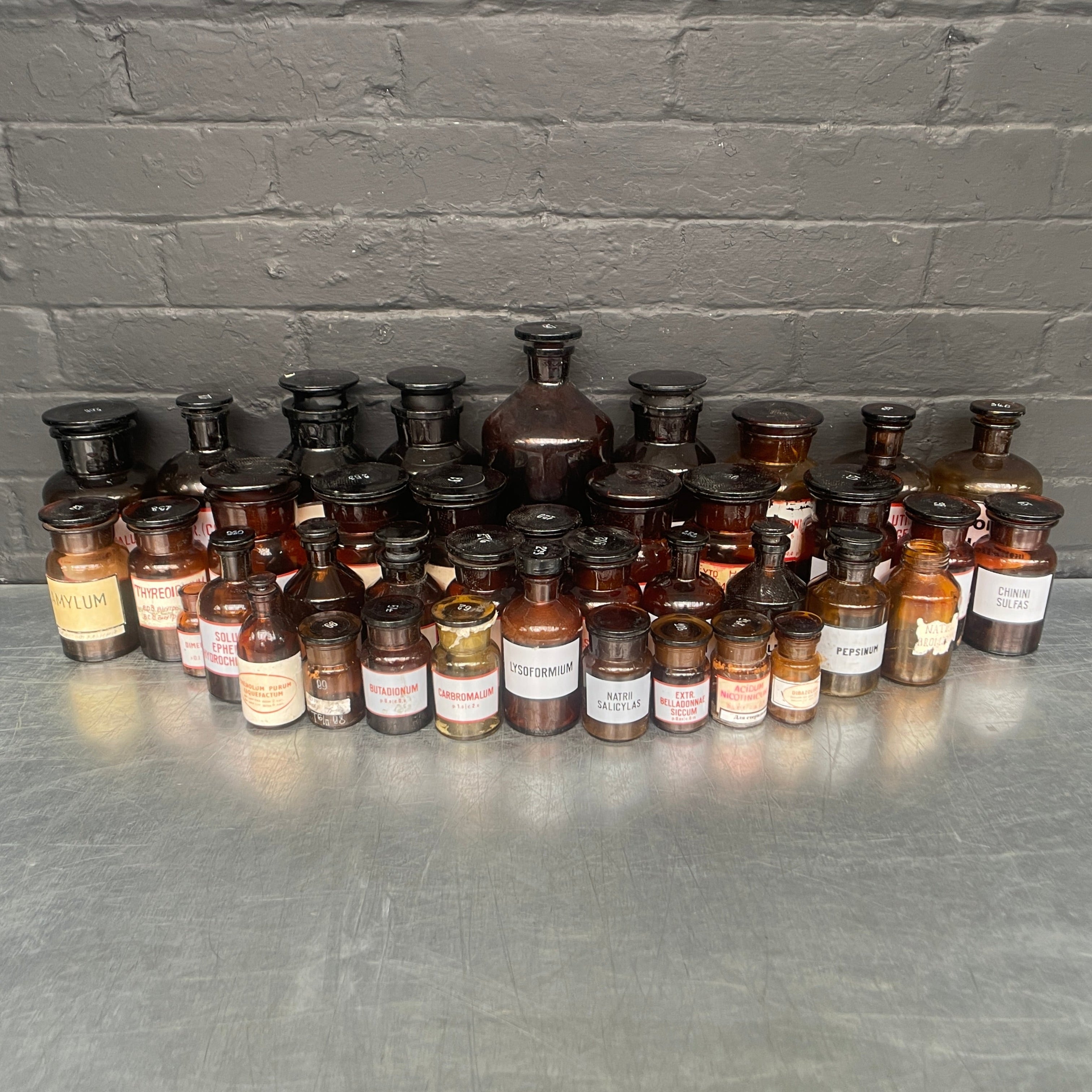 brown old vintage apothecary bottles chemist Industrial powerhouse props prop rental hire vintage movie film set dec