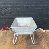 Industrial powerhouse props prop rental hire vintage movie film set dec galvanised wheel barrow old red silver