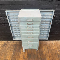 Industrial powerhouse props prop rental hire vintage movie film set dec opticians cabinet drawers green doors