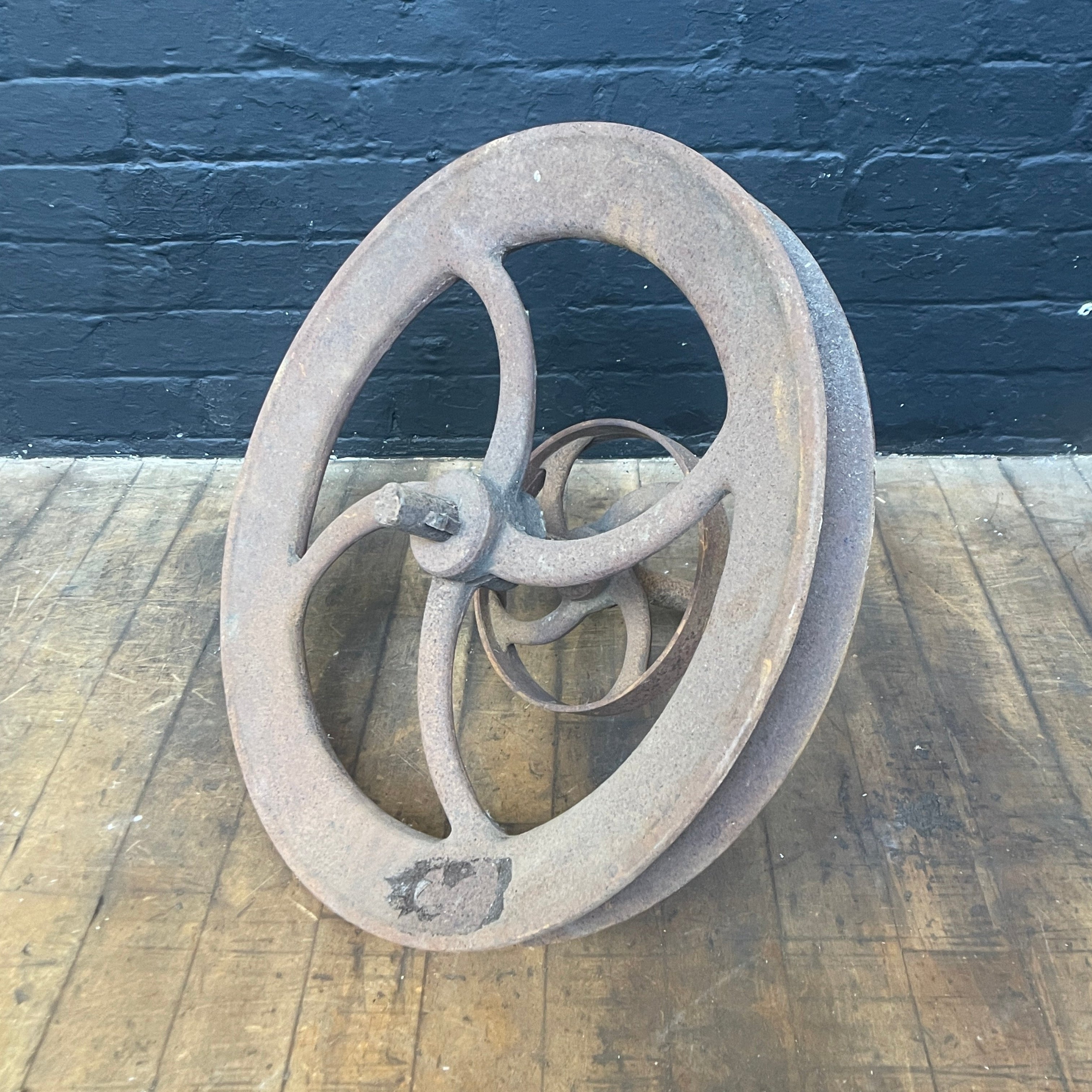 Industrial powerhouse props prop rental hire vintage movie film set dec rusty large machine wheel