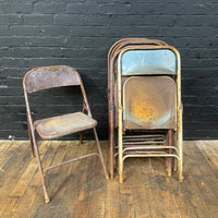 Industrial powerhouse props prop rental hire vintage movie film set dec rusty steel folding chair chairs 1
