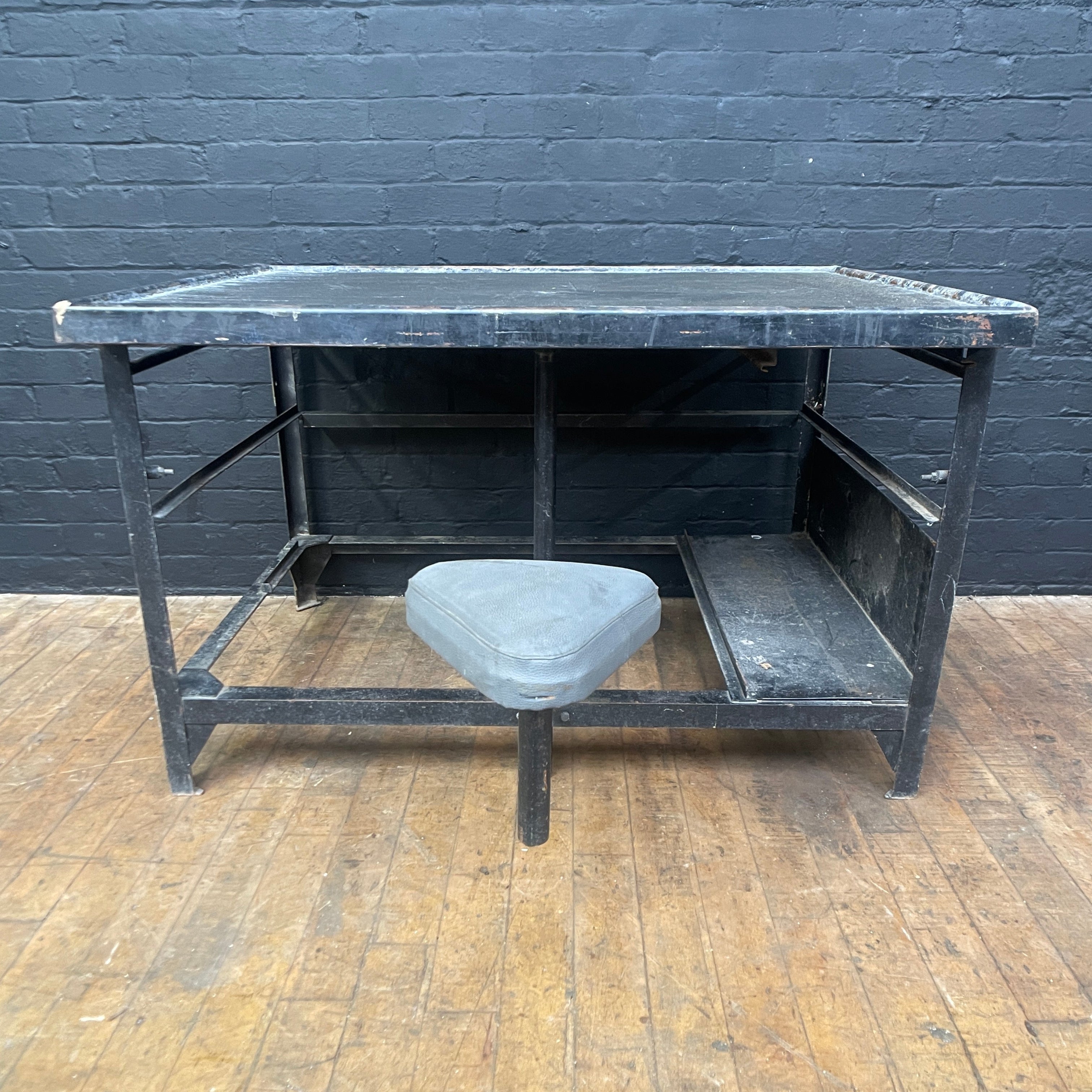 Workbench with fold out stool engineers Industrial powerhouse props prop rental hire vintage movie film set dec 2