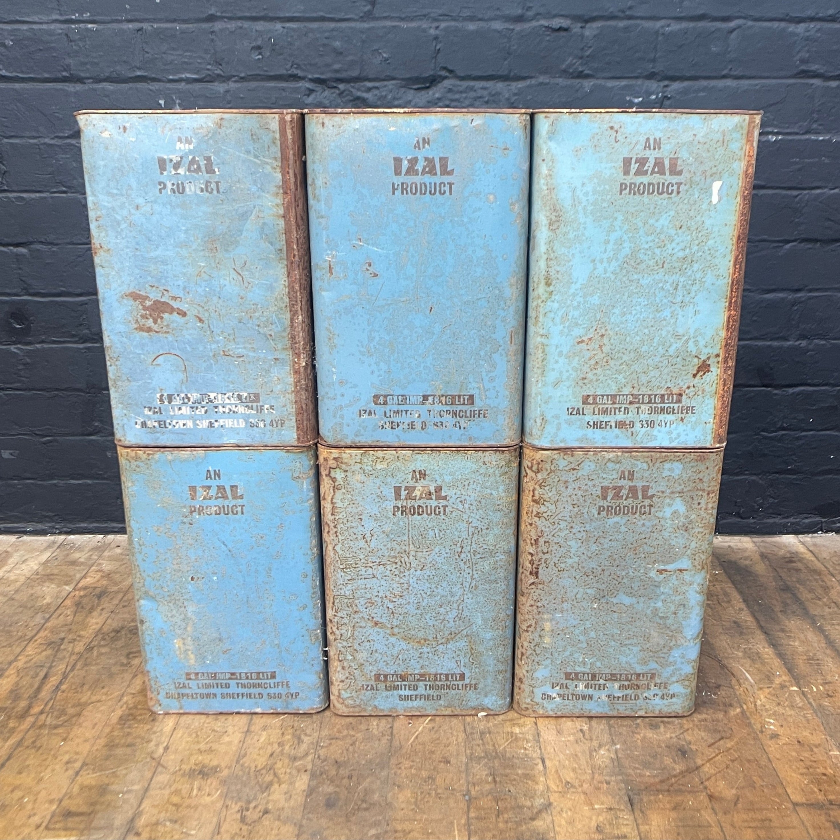 blue industrial storage tins stacks Industrial powerhouse props prop rental hire vintage movie film set dec