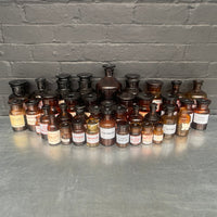 brown old vintage apothecary bottles chemist Industrial powerhouse props prop rental hire vintage movie film set dec