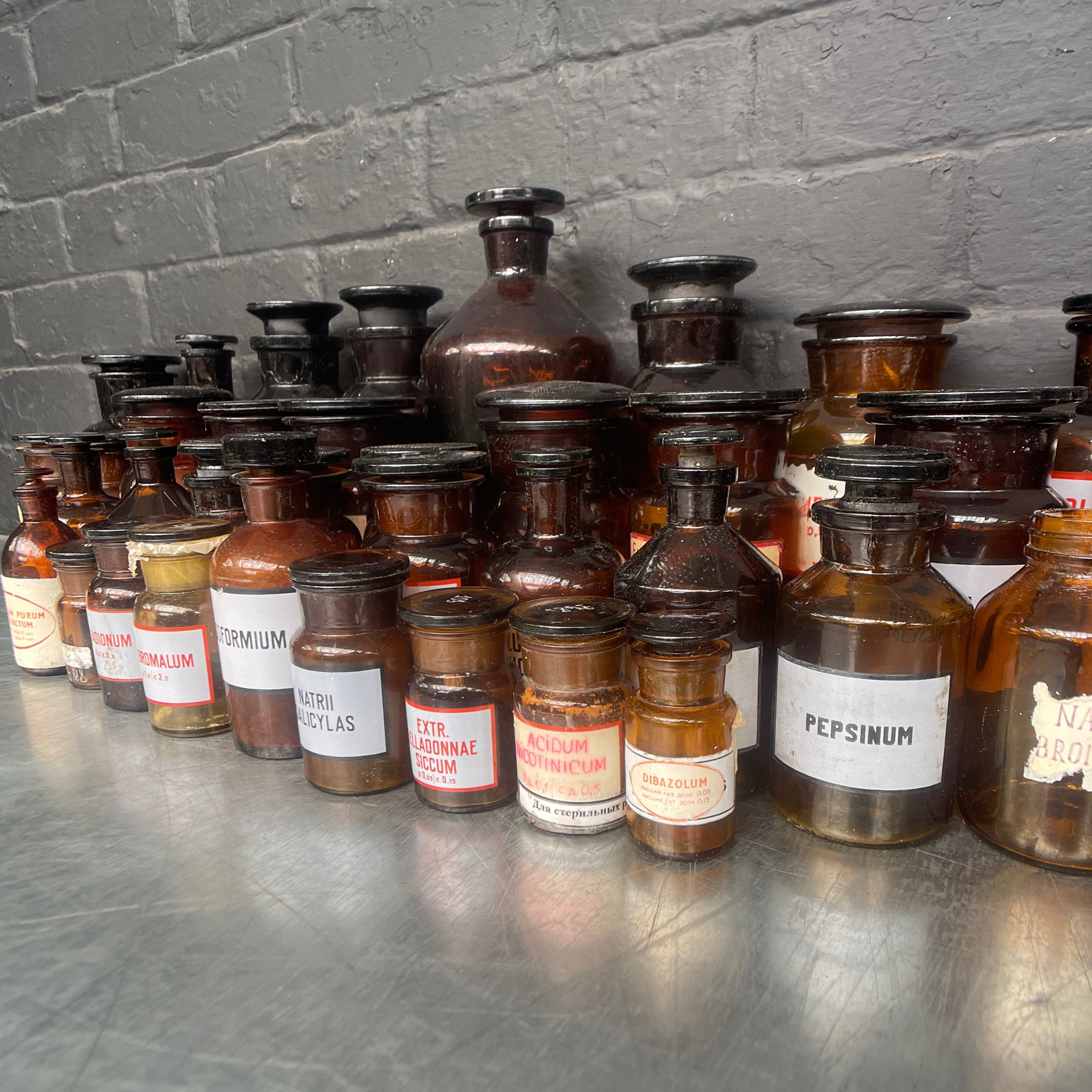 brown old vintage apothecary bottles chemist Industrial powerhouse props prop rental hire vintage movie film set dec 5