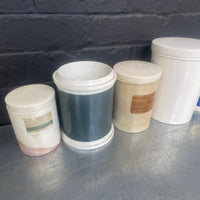 ceramic apothecary pots bottles containers chemist Industrial powerhouse props prop rental hire vintage movie film set dec 2