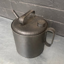 grey jug tin oil can steel metal Industrial powerhouse props prop rental hire vintage movie film set dec 1