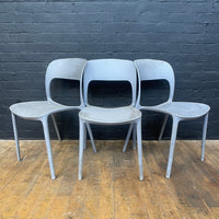 stackable plastic chairs grey Industrial powerhouse props prop rental hire vintage movie film set dec