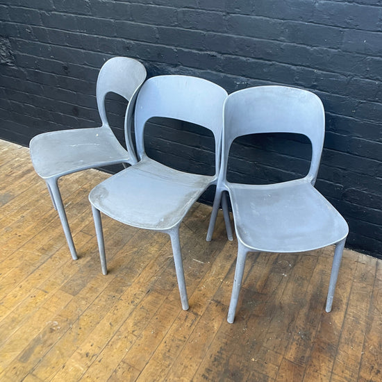Stackable plastic chairs Qty 12